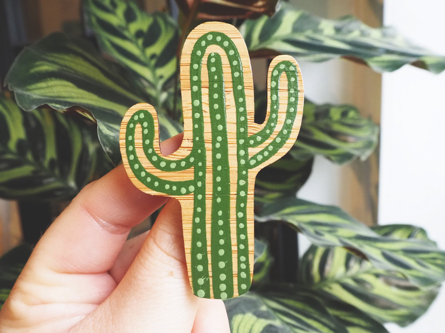 Bamboo brooch in cacti shape.
