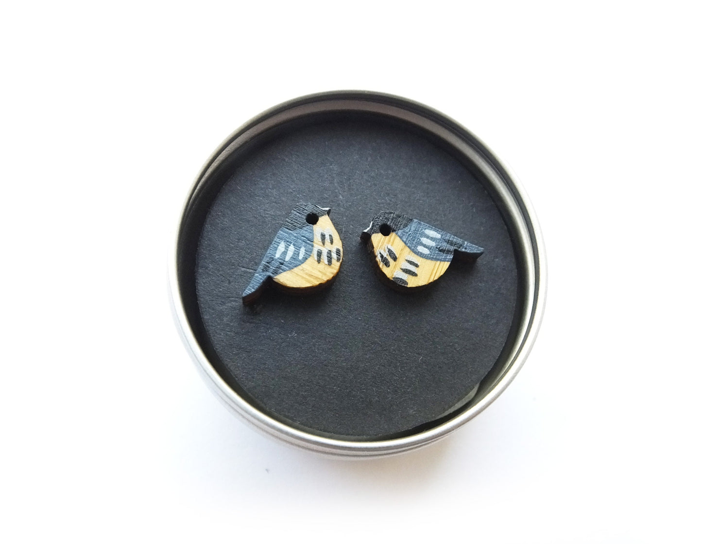 Tiny wooden bird earrings painted like a coal tit.