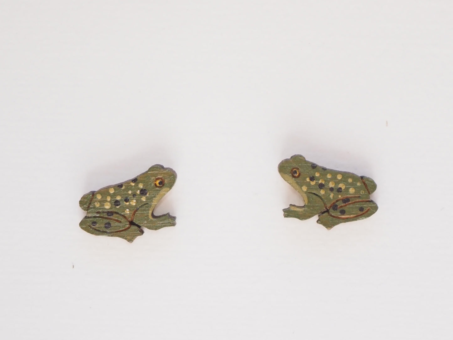 Hand Painted Frog Earrings - Made from Bamboo, showcasing green frogs with spotted designs.