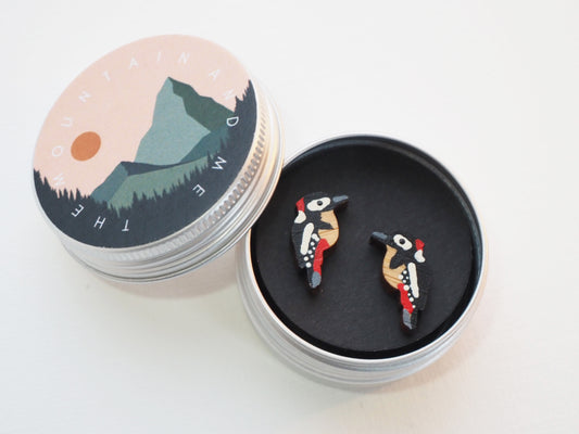 Great Spotted Woodpecker Earrings in a tin, featuring detailed hand-painted design by Claire Mills.