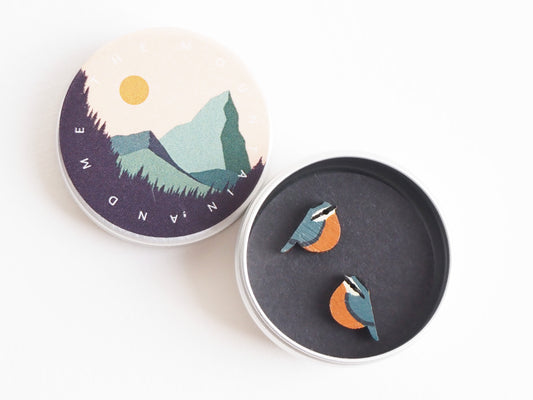 Nuthatch earrings in a tin box, hand painted bird studs showcasing British woodland style.